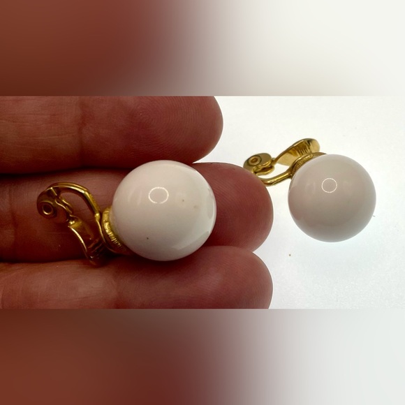 Vintage Signed Monet Gold Tone White
Lucite Ball Clip On Earrings - Picture 6 of 9